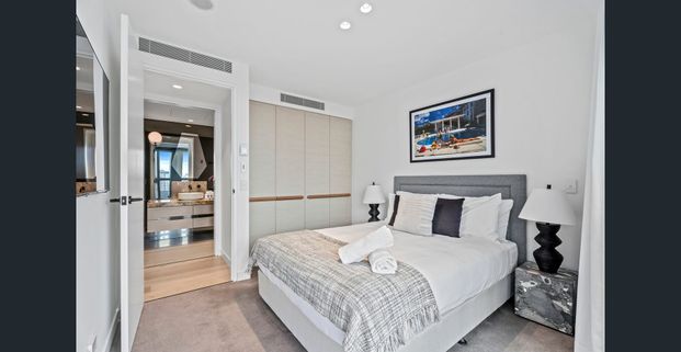 Fully Furnished Beachside Luxury at Jewel Residences - Photo 1