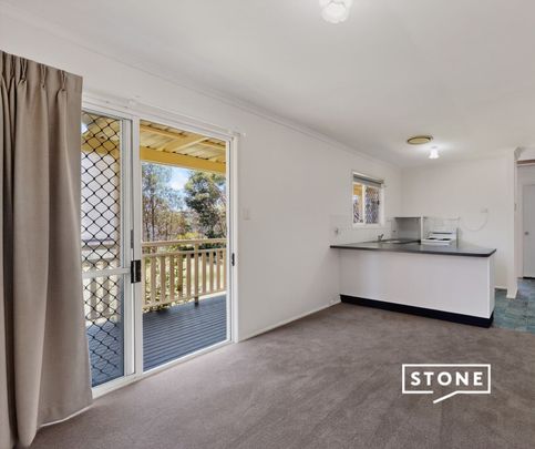 Low-Maintenance Living in a Quiet Complex with Pool – Perfect Location! - Photo 1