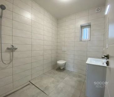 Příjemný byt po rekonstrukci s parkovacím místem a zahradou. - Photo 6