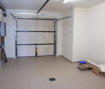 Bijzonder ruime woning met 3 slaapkamers, tuin en garage - Photo 4