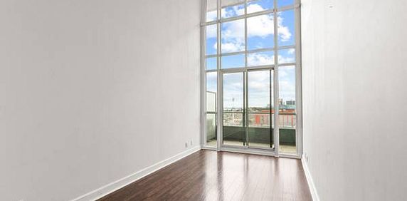 High ceilings parking included floor to ceiling windows! - Photo 2