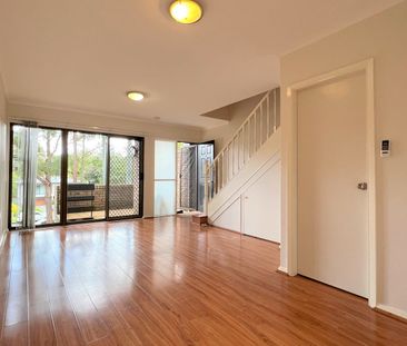 Renovated 2 bedroom townhouse in a peaceful and quiet location - Photo 1