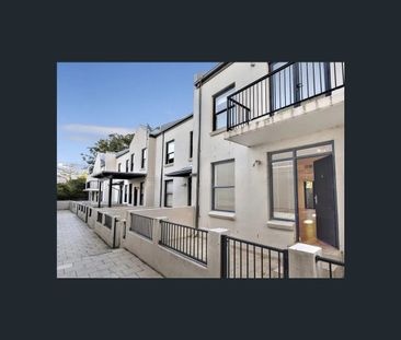 Discover this delightful 2-bedroom townhouse nestled in the heart o... - Photo 1