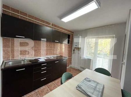 Apartament de 2 camere, decomandat, 55mp, zona UMF - Photo 4