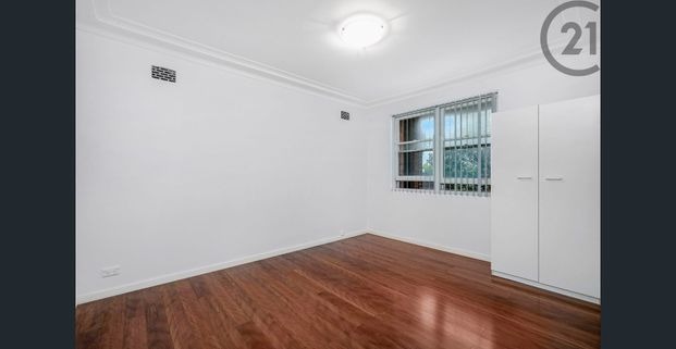 Top Floor Apartment Enjoying Coastal Living - Photo 1