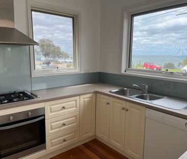 UPDATED TWO BEDROOM APARTMENT OVERLOOKING CORIO BAY - Photo 2