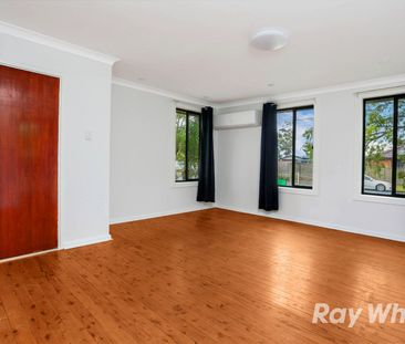 Neat 4 Bedroom Home with Comfort & Convenience - Photo 3