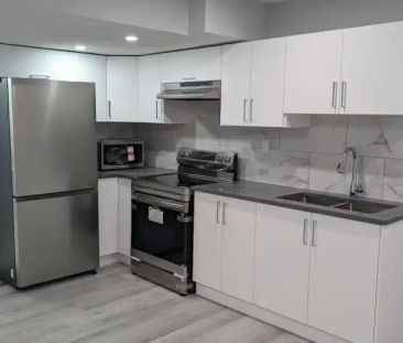 BRAND NEW LUXURY BASEMENT SUITE (1 BED + DEN) | ALL UTILITIES INCLU... - Photo 1