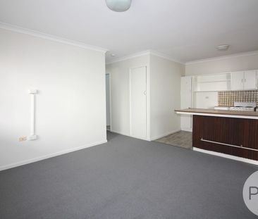 QUIET COMPLEX, QUIET STREET - NEAT AND TIDY TWO BEDDER! - Photo 2
