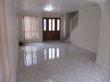 Three Bedroom Well Maintained Townhouse - Photo 2