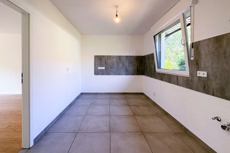 Familienfreundliches Wohnen nah am Zentrum – gepflegtes Reihenmittelhaus mit Garten und Garage - Foto 4