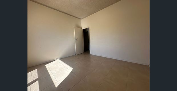 Functional, Low-Maintenance Ground Floor Unit – Available Now - Photo 1