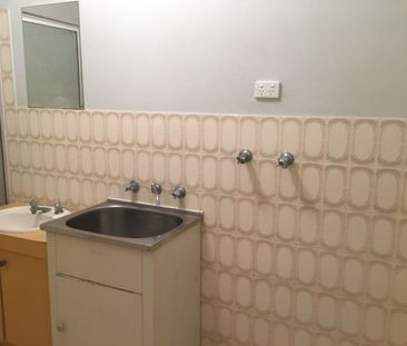 BRIGHT, BREEZY AND IDEALLY LOCATED! - Photo 6