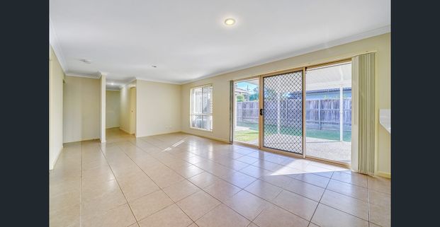 Spacious 4-Bedroom Family Home with Outdoor Entertaining & Double Garage - Photo 1