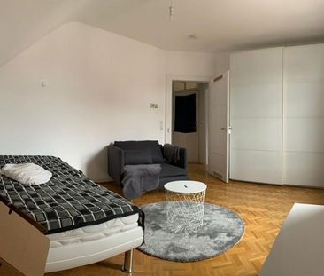 Charmantes Dach-Apartment mit Parkett und Wohnküche in der Oberurseler City - Foto 1