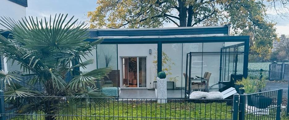 Traumhafte Bungalow-Wohnung mit Wintergarten, Garten & Klima - Photo 1