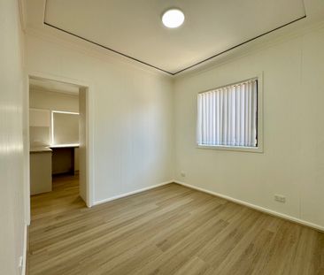 MODERN FAMILY HOME WITH MULTIPLE LIVING SPACES! - Photo 6