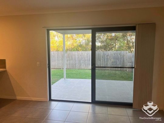 Beautiful 4-Bedroom Family Home in the Heart of Coomera - Photo 1