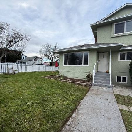 Large 3 bedroom suite in Fernwood. Fresh Paint and brand new flooring - Photo 3