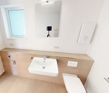 Weitläufige 2-Zimmer-Wohnung mit Loggia für moderne Ansprüche - Photo 5