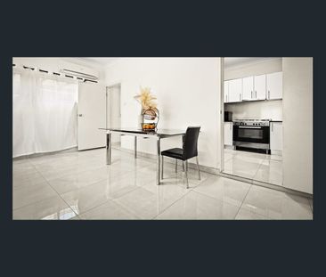 Spacious and Beautifully Renovated 5-Bedroom Brick Veneer Home in D... - Photo 2