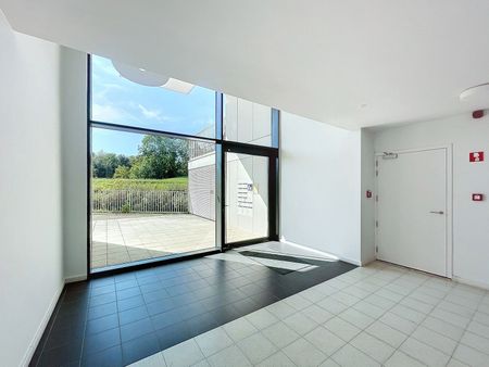 1 slpk app met terras en inpandige parkeerplaats - Photo 4