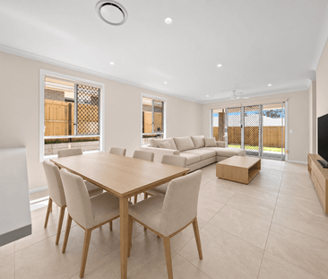 Brand-New Family Home with Ducted Air Conditioning & Large Backyard - Photo 1