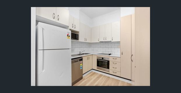 Spacious 4 Bedroom Apartment in Resort-Style Complex - Photo 1