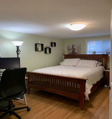 Upper Unit – Beautiful Carriage Home - Photo 1