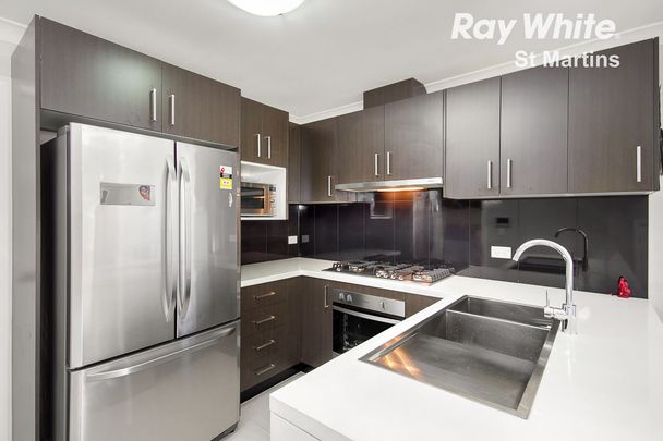 NEAR NEW 4 BEDROOM TOWN HOME WITH DOUBLE GARAGE - WALK TO ROOTY HILL TRAIN STATION - Photo 1