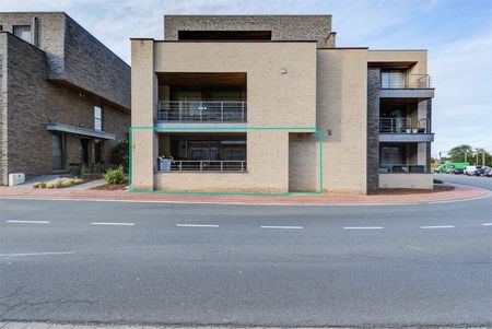 VERZORGD GELIJKVLOERS APPARTEMENT MET 2 SLAAPKAMERS EN AUTOSTAANPLAATS TE HOESELT - Photo 4