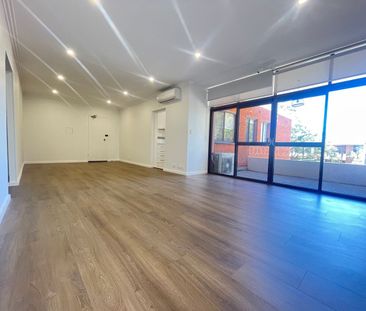 BRIGHT RENOVATED 2 BEDROOM TOP FLOOR UNIT - Photo 6