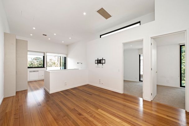 Contemporary Town Residence with Double Garage – Walk to Bay Street & the Beach - Photo 1