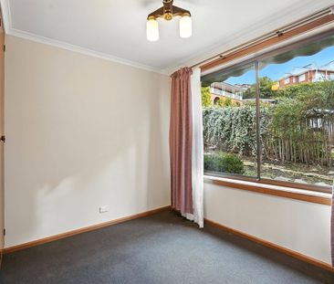 Tidy Two Bedroom Unit in a great location - Photo 5