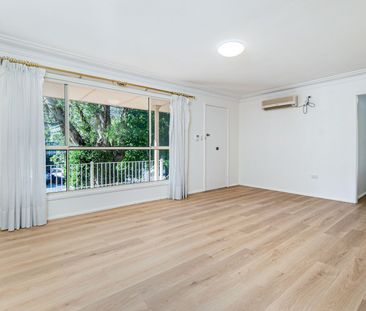 Charming Family Home with Spacious Layout & Low-Maintenance Yard - Photo 3