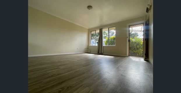 Brick 2-Bedroom Unit in Convenient Location - Photo 1