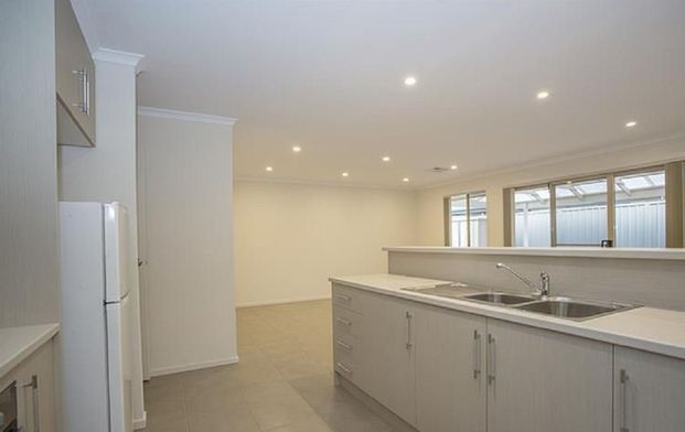 Well Maintained 3-Bedroom, 2-Bathroom Home - Photo 1