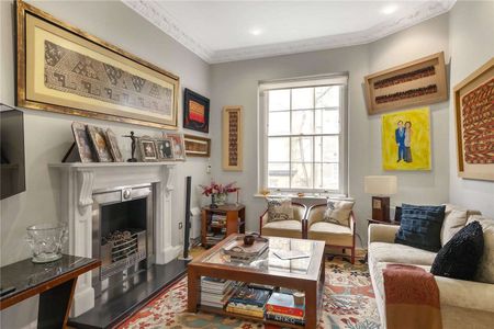 A 'key' Grade II listed part stucco fronted house, located just off Onslow Gardens. - Photo 4