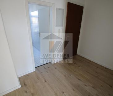 Sie suchen etwas Modernes? 2-Raum Wohnung mit neuer Einbauküche und neuem Boden! - Photo 5