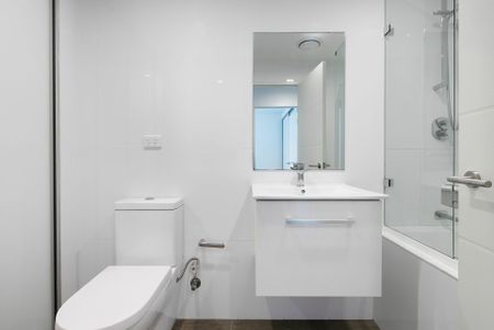 Modern Security Apartment with Study Nook & Parking in Prime Campsie Location - Photo 4