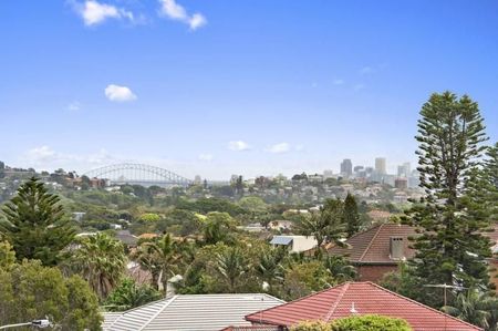 Top floor apartment with great views + undercover parking - Photo 5
