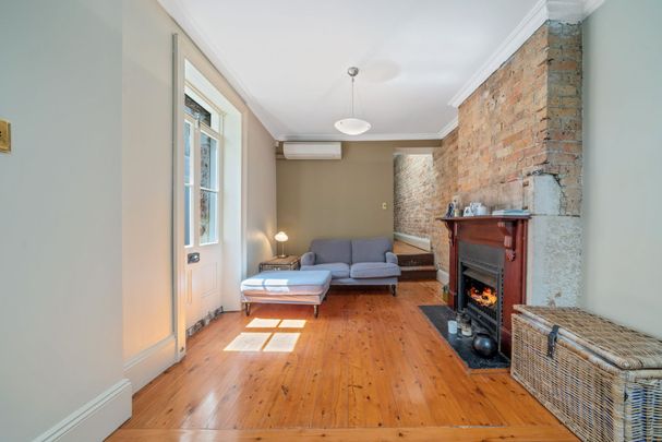 Character filled home in wide tree lined street - Photo 1