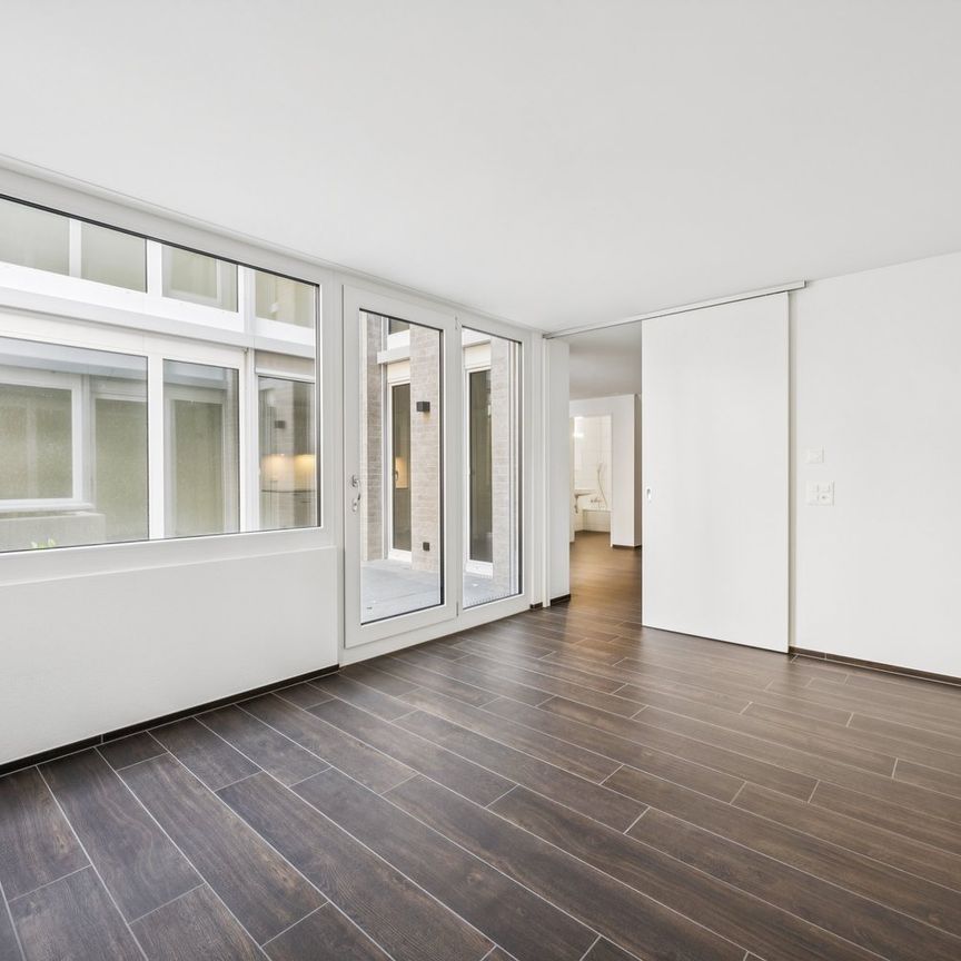 ERSTVERMIETUNG: Moderne Split-Level-Wohnung mit Charme in Zürich-Oerlikon - Photo 1