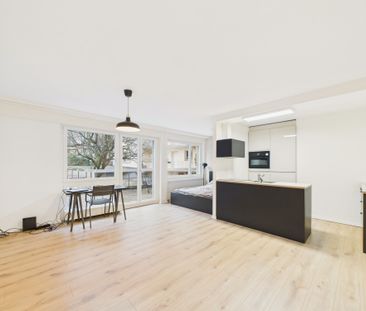 Quiet 1.5-room apartment with practical parking, Zurich - Photo 1