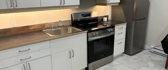 Basement Suite Studio | 1409 Rosehill Drive Northwest, Calgary - Photo 1