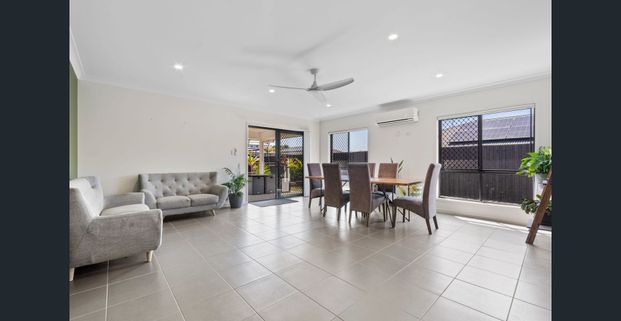 Spacious Family home complete with 2 living areas and pool - Photo 1