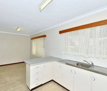 Centrally Located Family Home! - Photo 1