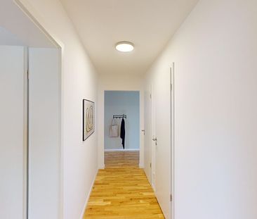 Platz für die ganze Familie: ideal geschnittene 4-Zimmer-Neubauwohnung mit EBK - Photo 1