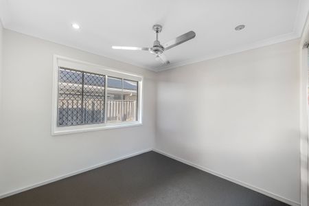 EASY LIVING ON HARMONY DRIVE - FRESH, BRIGHT, AND MOVE-IN READY AT A REDUCED PRICE! - Photo 3