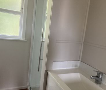 This generous two-bedroom unit offers an open-plan living area, two... - Photo 1